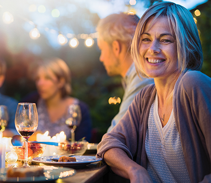 happy woman at dinner