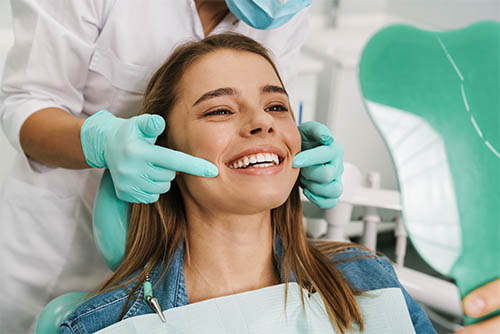 real estate agent in the dentist chair